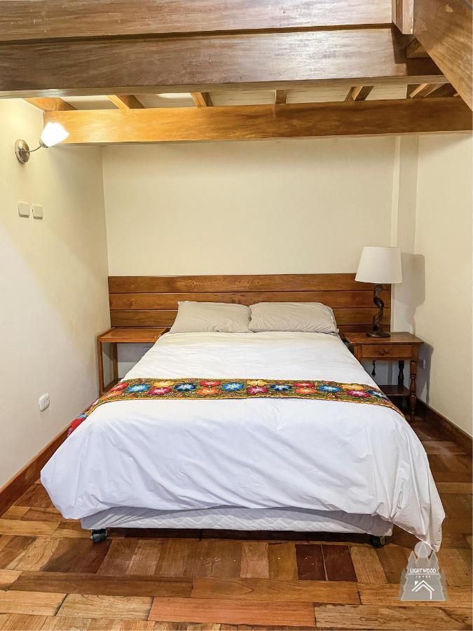 Light Wood Hotel Calca Buitenkant foto