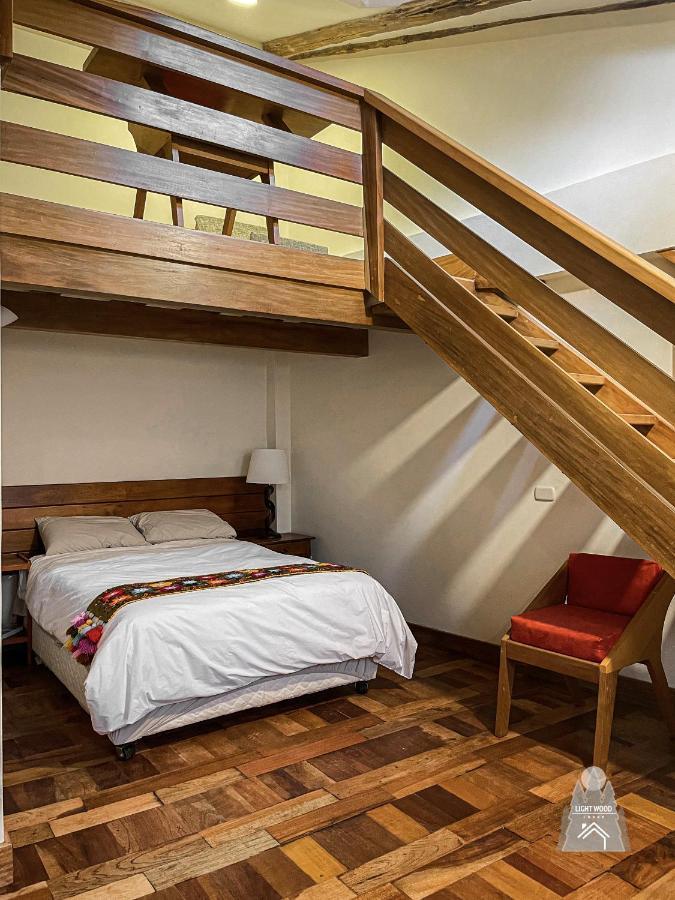 Light Wood Hotel Calca Buitenkant foto